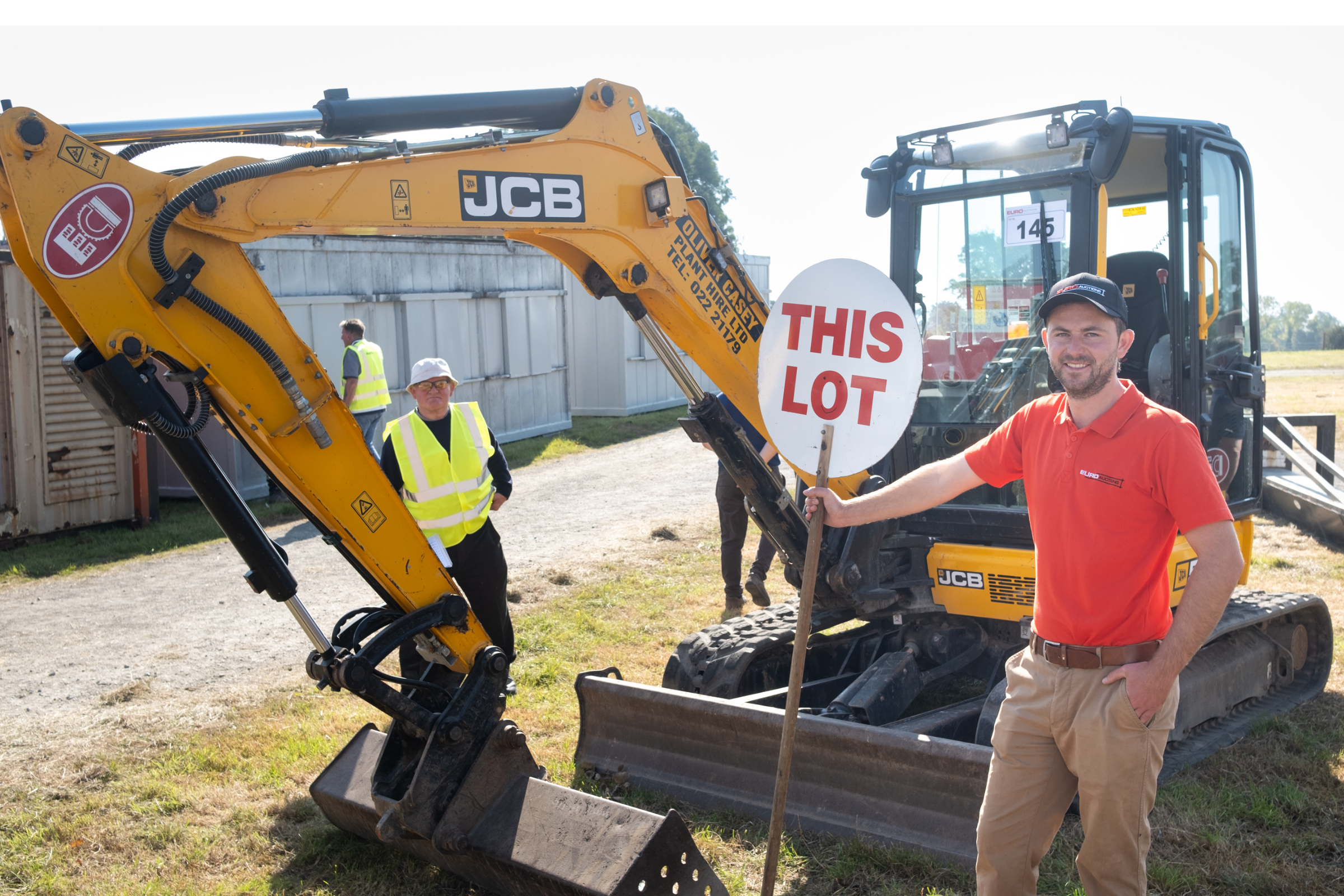 Man Holding This Lots Sign
